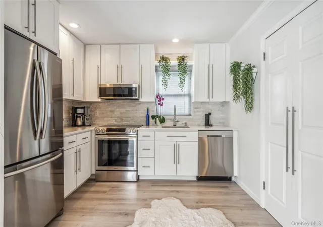 Photo 4 of Sale Pending at 55 Duckpond Dr N, Wantagh, NY 11793 | MLS# 995076 | Listing updated on 2026-06-30