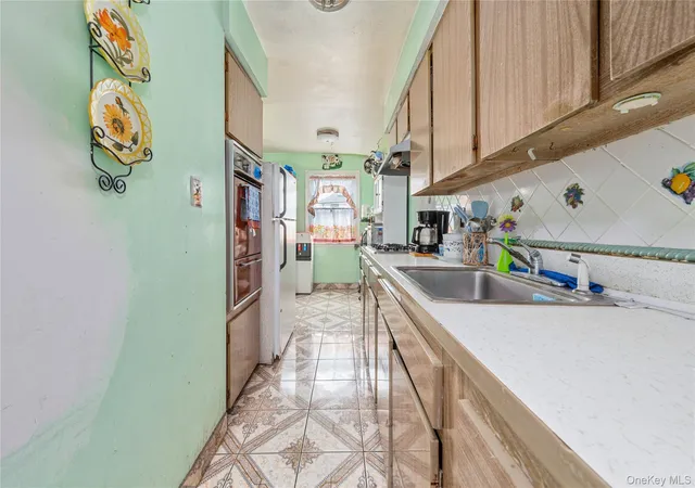 Photo 4 of Sale Pending at 217-35 Hempstead Ave, Queens Village, NY 11429 | MLS# 995163 | Listing updated on 2026-09-15