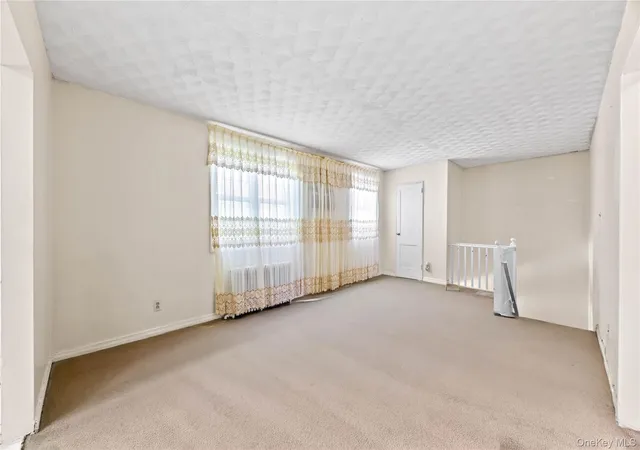 Photo 2 of Condo for sale at 223 52 65th Avenue #52B, Oakland Gardens, NY 11364 | MLS# 997546 | Listing updated on 2026-05-11