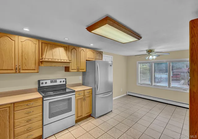 Photo 2 of Single family home for sale at 54 College Hills Dr, Brookhaven, NY 11738 | MLS# 998151 | Listing updated on 2026-09-20