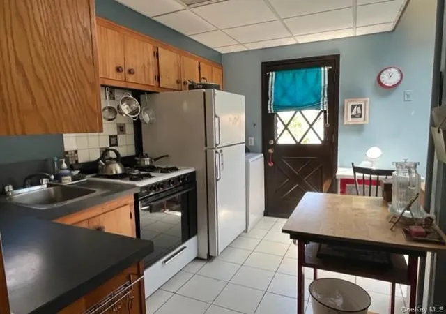 Photo 3 of Sale Pending at 34 29 208 Street, Bayside, NY 11361 | MLS# 998754 | Listing updated on 2026-07-20