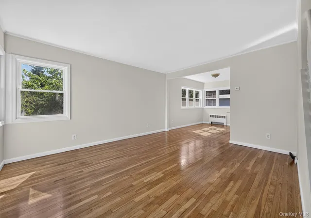 Photo 3 of Sale Pending at 48 Locust St, Westbury, NY 11590 | MLS# 1000789 | Listing updated on 2026-08-20
