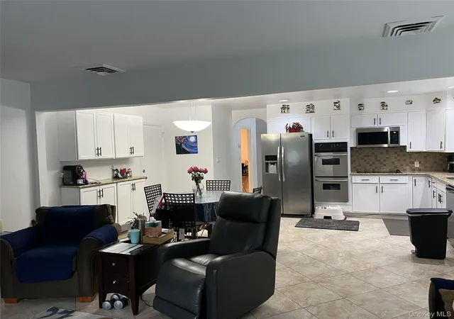 Photo 3 of Sale Pending at 10 Bonaire Dr, Dix Hills, NY 11746 | MLS# 1000956 | Listing updated on 2026-06-18