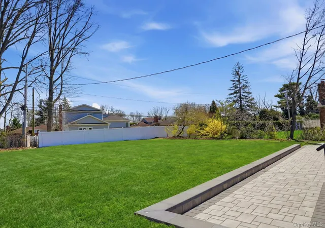 Photo 3 of Single family home for sale at 2040 Wellington Ct, Westbury, NY 11590 | MLS# 1002517 | Listing updated on 2026-05-21
