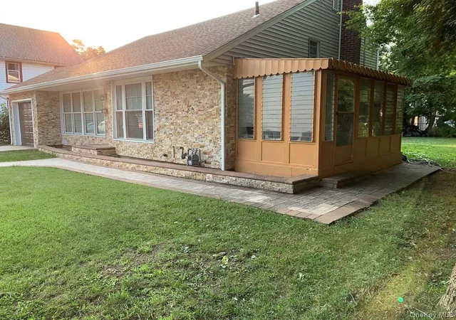 Photo 2 of Single family home for sale at 143 E Fulton Ave, Hempstead, NY 11575 | MLS# 1003211 | Listing updated on 2026-08-16
