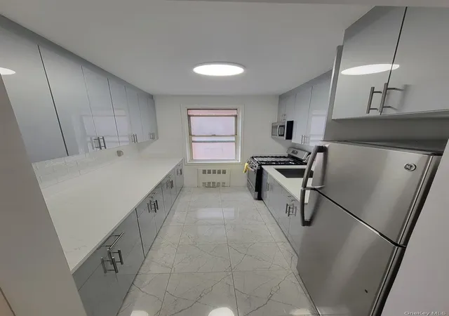 3rd image of 64-41 Saunders St, New York, NY 11238