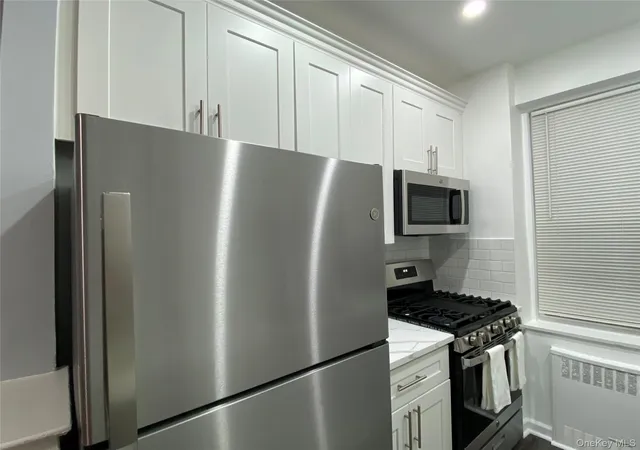 5th image of 63-60 102nd St, New York, NY 11374