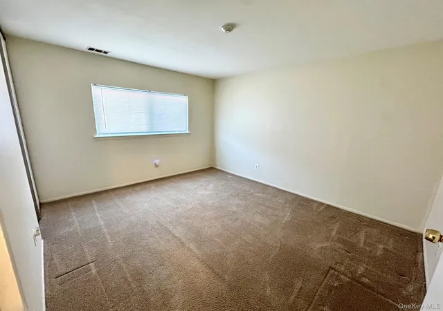 Photo 3 of Condo for sale at 71 Pointe Cir S #71, Coram, NY 11727 | MLS# 1008552 | Listing updated on 2026-09-17