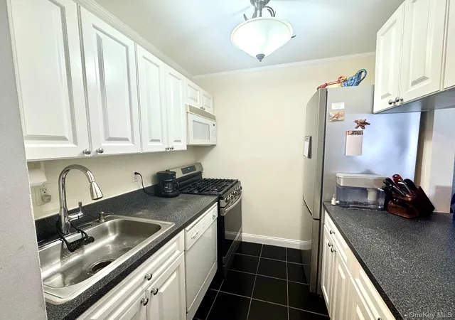Photo 2 of Condo for sale at 1 Aspen Ct #1A, Coram, NY 11727 | MLS# 1008877 | Listing updated on 2026-09-13
