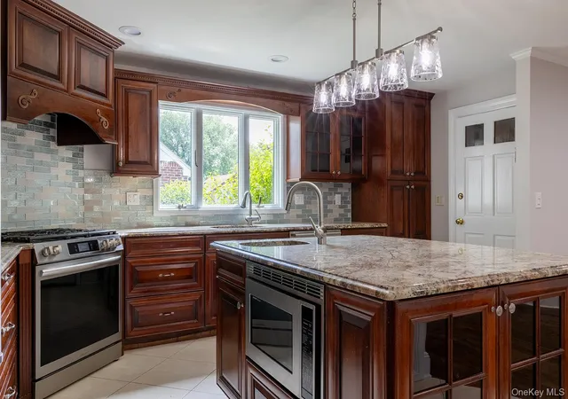 Photo 3 of Single family home for sale at 478 Carnation Ave, Hempstead, NY 11001 | MLS# 1009955 | Listing updated on 2026-10-03