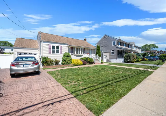 Photo 2 of Single family home for sale at 52 Eastlake Ave, Massapequa Park, NY 11762 | MLS# 1012298 | Listing updated on 2026-10-03
