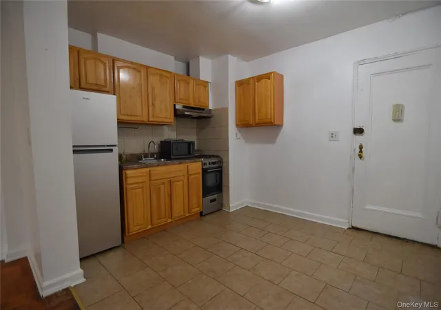 3rd image of 102-32 65Th Ave, New York, NY 11375