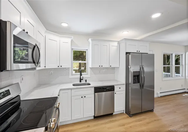 Photo 2 of Single family home for sale at 9 Phoenix Rd, Brookhaven, NY 11778 | MLS# 1013656 | Listing updated on 2026-09-05