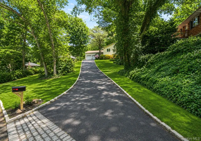 Photo 2 of Sale Pending at 61 Ledgewood Dr, Smithtown, NY 11787 | MLS# 1014086 | Listing updated on 2026-08-15
