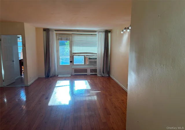3rd image of 98 20 62nd Dr, New York, NY 11374