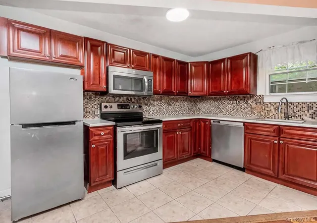 3rd image of 229A W Tremont Ave #A, New York, NY 10453 | MLS# 1016093