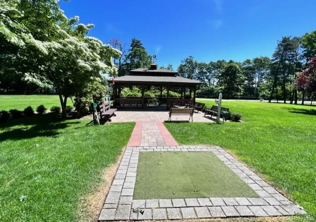 2nd image of 312 Woodbridge Dr, Ridge, NY 11961