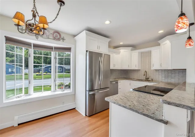 3rd image of 71 Singingwood Dr, Islip, NY 11741 | MLS# 1018221
