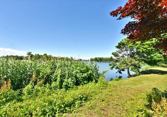 33rd image of 687 Golf Dr, Hempstead, NY 11581 | MLS# 1018407