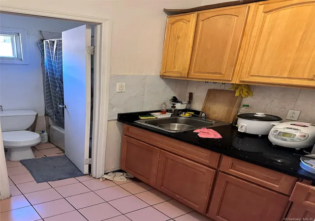 Photo 2 of Single family home for sale at 13611 Carlton Pl, New York, NY 11354 | MLS# 1019099 | Listing updated on 2026-07-31