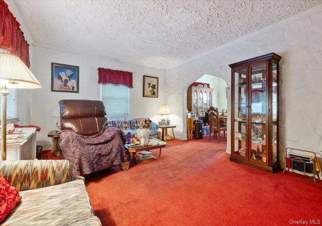 Photo 2 of Single family home for sale at 11590 223rd Street, Cambria Heights, NY 11411 | MLS# 1019245 | Listing updated on 2026-08-11