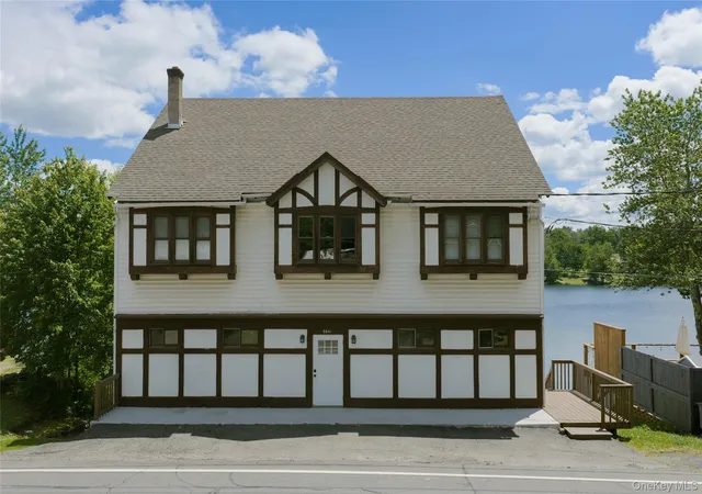 Listing Photo 2 - Condo for sale in building located at 6641 Narrowsburg Rd, Lake Huntington, NY 12752 - Unit #