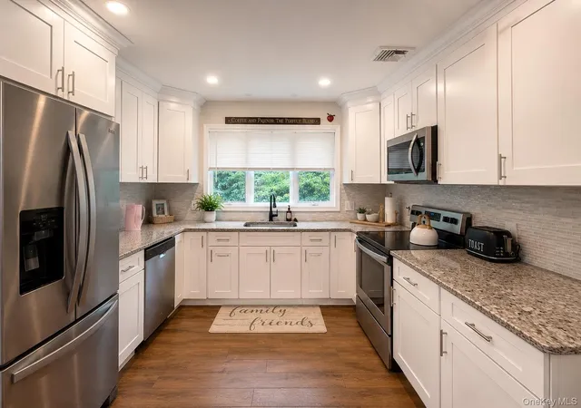 Photo 2 of Sale Pending at 87 Sally Ln, Ridge, NY 11961 | MLS# 1020598 | Listing updated on 2026-09-25