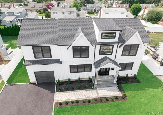 Photo 3 of Single family home for sale at 60 Westwood Rd S, Massapequa Park, NY 11762 | MLS# 1021568 | Listing updated on 2026-10-04