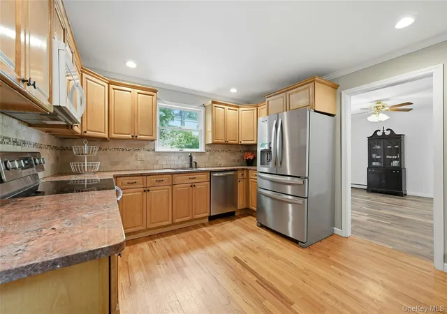 Photo 3 of Sale Pending at 15 Birch Rd, Brookhaven, NY 11778 | MLS# 1022052 | Listing updated on 2026-08-09