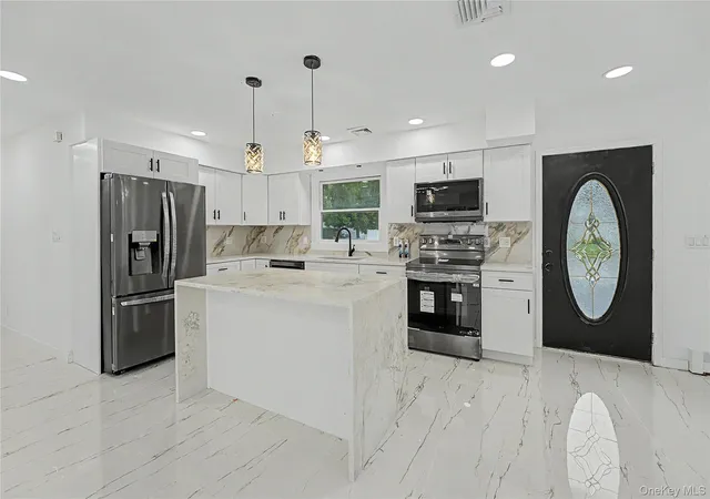 Photo 2 of Single family home for sale at 6 Regal Ln, Hempstead, NY 11756 | MLS# 1022224 | Listing updated on 2026-08-30