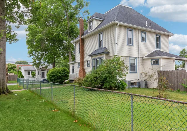 Photo 2 of Single family home for sale at 112 Woods Ave, Hempstead, NY 11575 | MLS# 1022313 | Listing updated on 2026-08-23