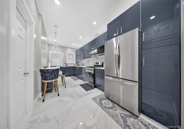 Photo 3 of Multi family home for sale at 104 21 92nd Avenue, Richmond Hill, NY 11418 | MLS# 1022488 | Listing updated on 2026-07-08