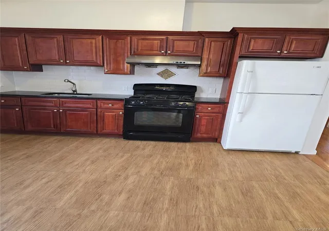 Photo 3 of Sale Pending at 147-30 Cherry Ave, Flushing, NY 11355 | MLS# 1022490 | Listing updated on 2026-08-29