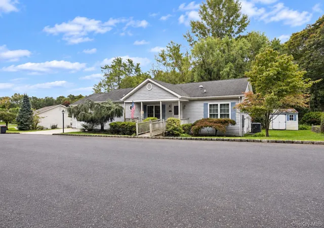 Photo 2 of Single family home for sale at 1407 Middle Rd #245, Riverhead, NY 11933 | MLS# 1022776 | Listing updated on 2026-10-07