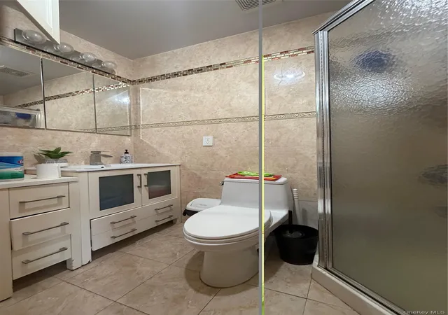 Photo 3 of Multi family home for sale at 10475 48th Avenue, New York, NY 11368 | MLS# 1022865 | Listing updated on 2026-08-11