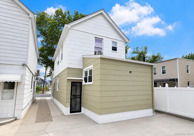 Photo 2 of Single family home for sale at 10713 Sutter Ave, Ozone Park, NY 11417 | MLS# 1023042 | Listing updated on 2026-07-15