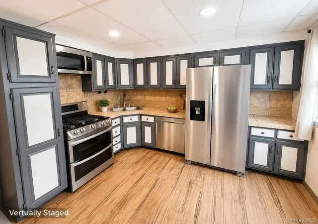 Photo 4 of Single family home for sale at 10713 Sutter Ave, Ozone Park, NY 11417 | MLS# 1023042 | Listing updated on 2026-07-15