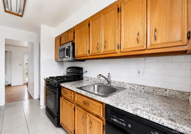 Photo 3 of Single family home for sale at 335 Roquette Ave, Hempstead, NY 11001 | MLS# 1023696 | Listing updated on 2026-10-07