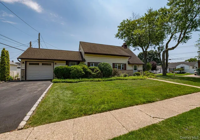 Photo 2 of Single family home for sale at 2052 Wilson Ln, Hempstead, NY 11554 | MLS# 1023768 | Listing updated on 2026-08-08