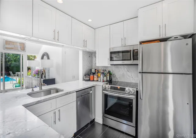 Photo 2 of Single family home for sale at 77 Bay Walk, Brookhaven, NY 11782 | MLS# 1024478 | Listing updated on 2026-07-29