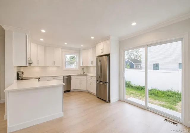 Photo 4 of Single family home for sale at 1316 R St, Hempstead, NY 11003 | MLS# 1024871 | Listing updated on 2026-07-29