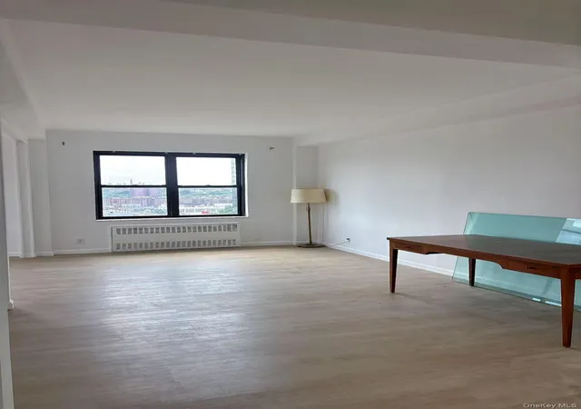 3rd image of 99-05 63Rd Dr, New York, NY 11374