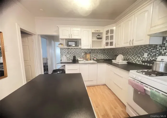 17th image of 127 06 103rd, South Richmond Hill, NY 11419 | MLS# 1025994