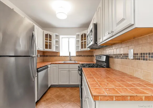 Photo 3 of Sale Pending at 93 29 91st Avenue, New York, NY 11421 | MLS# 1026352 | Listing updated on 2026-08-04