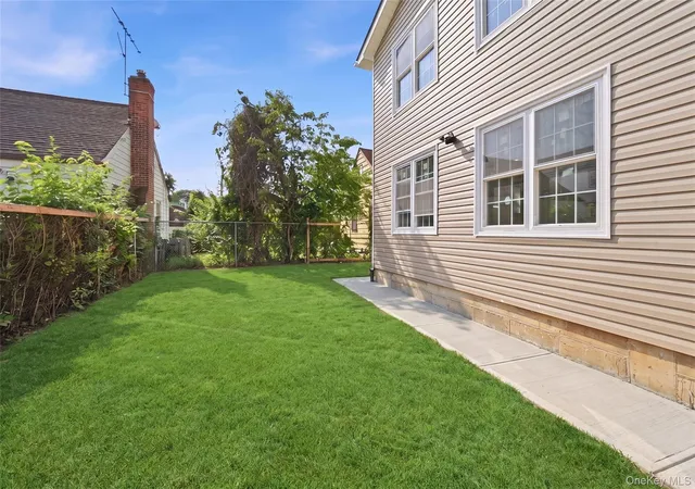 Photo 3 of Multi family home for sale at 241 33 143rd Avenue, New York, NY 11422 | MLS# 1026592 | Listing updated on 2026-09-16