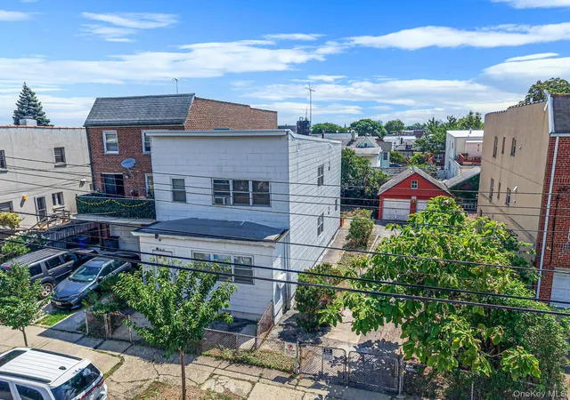 1st image of 52 67 72nd St, New York, NY 11378 | MLS# 1026875