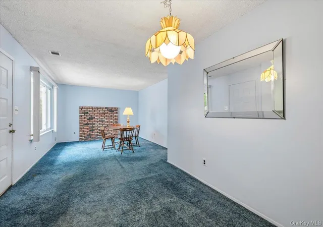 Photo 4 of Sale Pending at 221 Springmeadow Dr #J, Holbrook, NY 11741 | MLS# 1027712 | Listing updated on 2026-08-29