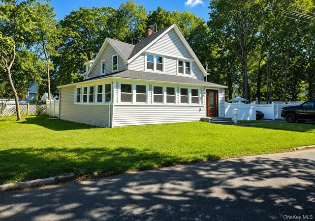 Photo 2 of Single family home for sale at 165 Cedar St, Amityville, NY 11701 | MLS# 1028012 | Listing updated on 2026-07-21