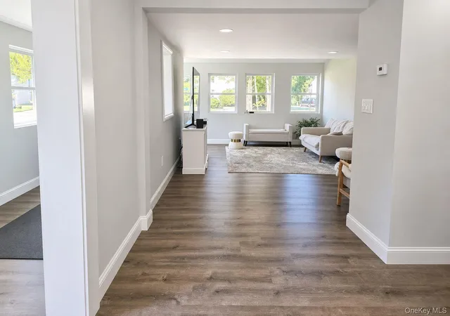 Photo 3 of Single family home for sale at 165 Cedar St, Amityville, NY 11701 | MLS# 1028012 | Listing updated on 2026-07-21