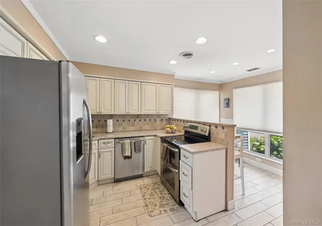 Photo 3 of Condo for sale at 100 Baker Ct #90, Hempstead, NY 11558 | MLS# 1028219 | Listing updated on 2026-08-16